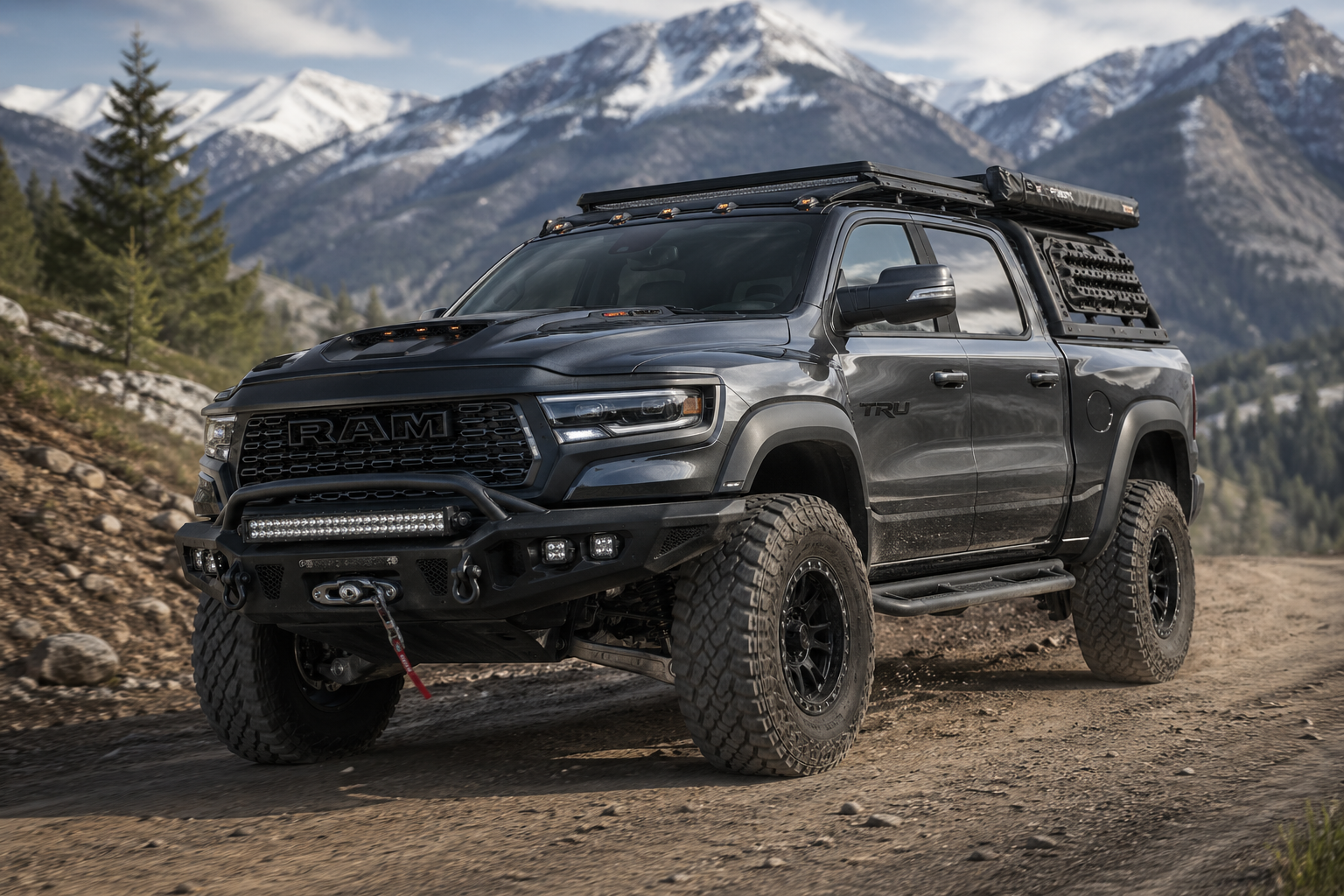 Lifted Ram truck on a mountain dirt road